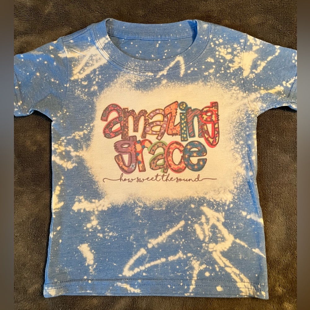 Toddler Bella Canvas bleach splatter t-shirt. Fits size 18-24 month/2T.